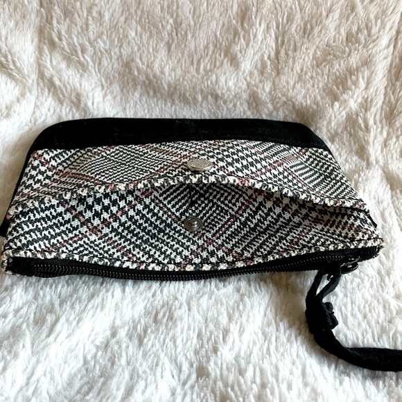Black/white with red accent stripe wristlet. Outside button close slip pocket. - Picture 3 of 4